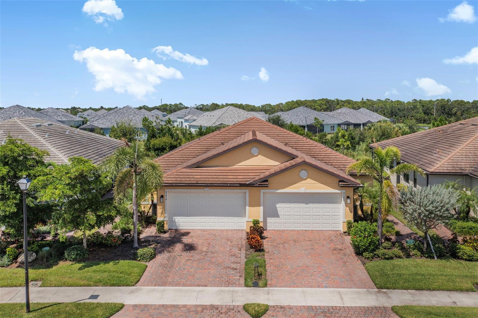 Welcome to this move-in ready 2 bedroom, 2 bathroom villa with a flexible bonus room in the gated community of The Preserve at West Villages in Wellen Park. Built in 2020 and gently used seasonally, this home offers peace of mind with a concrete tile roof, hurricane shutters, a landscaped privacy buffer, and its location in the X flood zone. The open-concept design highlights a granite kitchen with crown-molded cabinets, Whirlpool appliances, double pantry closets, and a spacious island that flows into bright living areas with triple sliding doors leading to the screened patio. The primary suite features dual walk-in closets, a private water closet, and extra storage, while the guest bedroom also has a walk-in closet. Smart home features including keypad entry and an IQPanel system provide modern convenience.
The Preserve offers resort-style amenities with pickleball courts, a pool, and a fitness center, and the HOA covers lawn care, irrigation, and exterior maintenance for a worry-free lifestyle. Just outside the gates, enjoy all that Wellen Park has to offer with Downtown Wellen’s dining, shopping, splash pad, trails, kayak launches, and Grand Lake. CoolToday Park, the spring training home of the Atlanta Braves, is nearby, along with kayaking on the Myakka River, Warm Mineral Springs, and the sandy shores of Manasota Beach. This villa combines comfort, community, and location for the ultimate Florida lifestyle. **THIS PROPERTY QUALIFIES FOR A 1% LENDER INCENTIVE IF USING PREFERRED LENDER. INQUIRE FOR MORE DETAILS.**