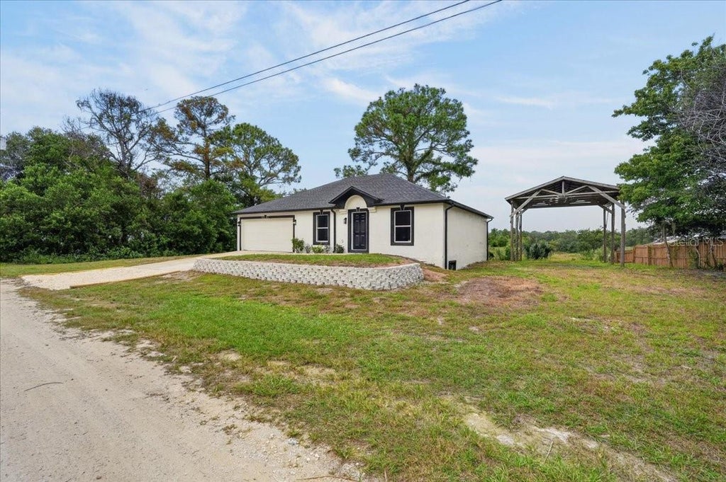 Photo of 8221 Normandy Drive, Weeki Wachee, FL 34613 (MLS # TB8556354)