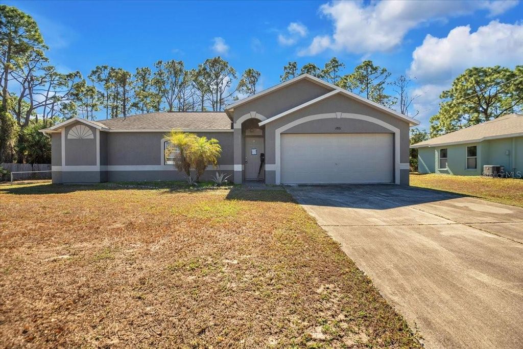 Photo of 1881 Marconi Avenue, North Port, FL 34286 (MLS # C7521059)