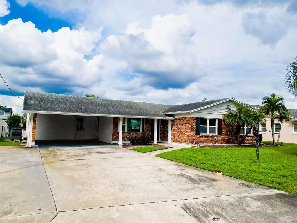 Photo of 8723 Hickorywood Lane, Tampa, FL 33615 (MLS # TB8550971)