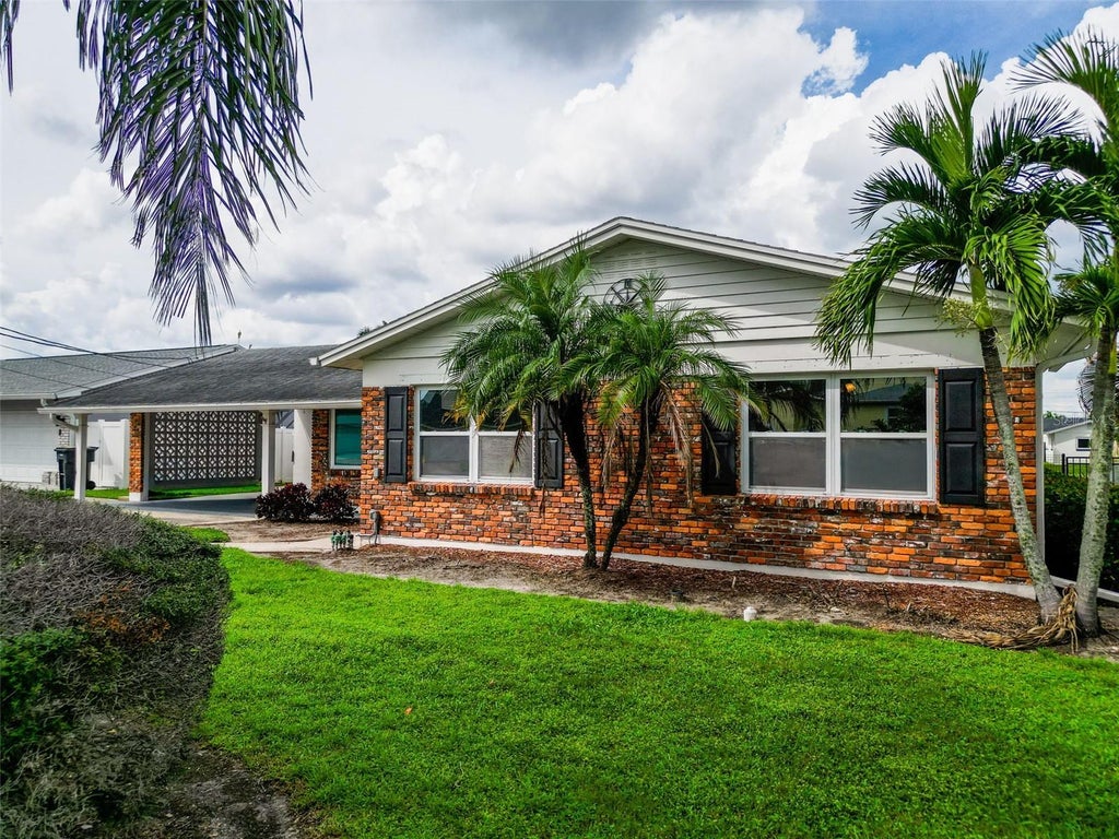 Photo of 8723 Hickorywood Lane, Tampa, FL 33615 (MLS # TB8550971)