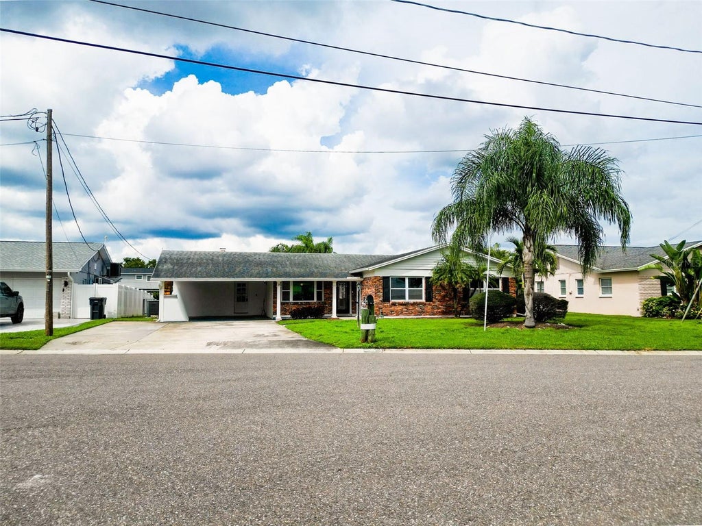 Photo of 8723 Hickorywood Lane, Tampa, FL 33615 (MLS # TB8550971)