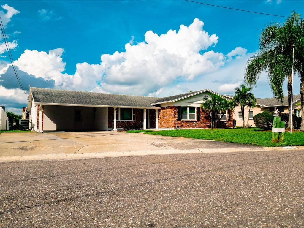 Photo of 8723 Hickorywood Lane, Tampa, FL 33615 (MLS # TB8550971)