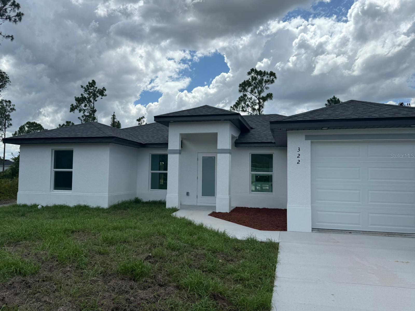 Welcome to your dream home! This stunning new construction single-family home in Lehigh Acres, offers the perfect blend of comfort in one
floor, style, and convenience. The home features 3 spacious bedrooms, including a master bedroom, 2 bathrooms, One-car garage for added
convenience and storage. Open floor plan perfect for entertaining and everyday living. Porcelain floors throughout, quartz countertops in
kitchen. Perfect Location for a relaxed lifestyle with easy access to shopping, dining, and entertainment. Enjoy the warm Florida climate and
outdoor activities like golfing, fishing, and exploring the nearby natural areas. Don't miss out this opportunity!