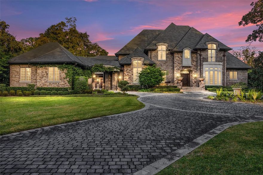 Interior photos coming soon! Opulent 15,000 square foot estate, completed in 2017, located in one of Ocala's most sought after areas. This majestic masterpiece has a towering roof line that reaches heights of nearly 40' and is adorned with 50 year shingles. The craftsmanship is displayed in its brick and stone exterior wall coverings, copper gutters and downspouts, Andersen Windows and Doors and front entry and porch with Travertine tile. At nearly 11,370 square feet of living space, this 6 BEDROOM, 7 FULL BATH AND 5 HALF BATH home is the perfect blend of exquisite finishes and practicality. The Grand Foyer, Library, Dining Room and Great Room have custom, hand crafted millworking that sets the stage for the true magnificence this home presents. The Great Room boasts 25' ceilings with wood beams and an Isokern Fireplace box with surround designed by Francois & Co. The Gourmet Chefs kitchen has all Smithport Cabinetry, Wolf and Sub Zero appliances and stone counter tops. There is also a Butler's Pantry with a full Prep Kitchen. The downstairs Primary Suite has 12' ceilings, wood floors and sitting area overlooking the pool. There is also a custom built DOG KENNEL just off the suite as well. The Primary Bathroom has 2 separate water closets, 2 custom closets with copious amounts of space, washer/dryer and an infared sauna. There is a separate Guest Suite with its own entrance downstairs as well. Overlooking the dramatic pool area is an oversized Game Room and separate Theater Room. There are 4 Bedrooms upstairs as well as a separate Bonus Room with Bunk Beds and a Juliette Balcony off of the front Bedroom. And don't miss the full basement located behind the hidden door with a large open space, 1/2 bath and additional storage space. Also, there is a CAR ELEVATOR that lowers cars to the lower level, 2 car garage located in the basement and a glass Nana Wall system perfectly designed to show off that one of a kind automobile. With the lower garage, there is space for 7 vehicles. The 42'x20' pool has nearly 4000 square feet deck and loggia space lined with Travertine Tile and has 2 hot tub areas. The upper Cabana area has 2 Fire and Water Bowls and an impressive Gas Fireplace. This spectacular estate is the epitome of distinction and style.