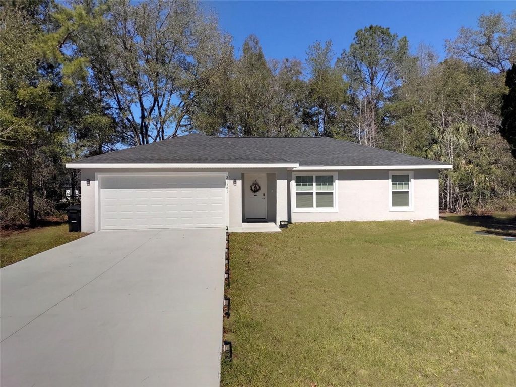 Photo of 21301 SW Rainbow Lakes Boulevard, Dunnellon, FL 34431 (MLS # OM721424)