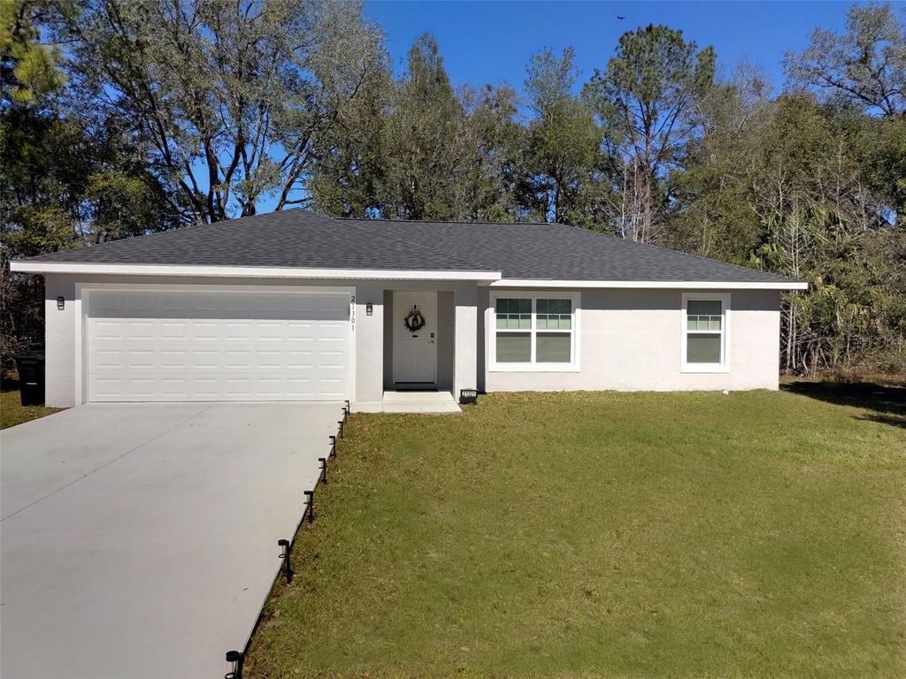 Photo of 21301 SW Rainbow Lakes Boulevard, Dunnellon, FL 34431 (MLS # OM721424)