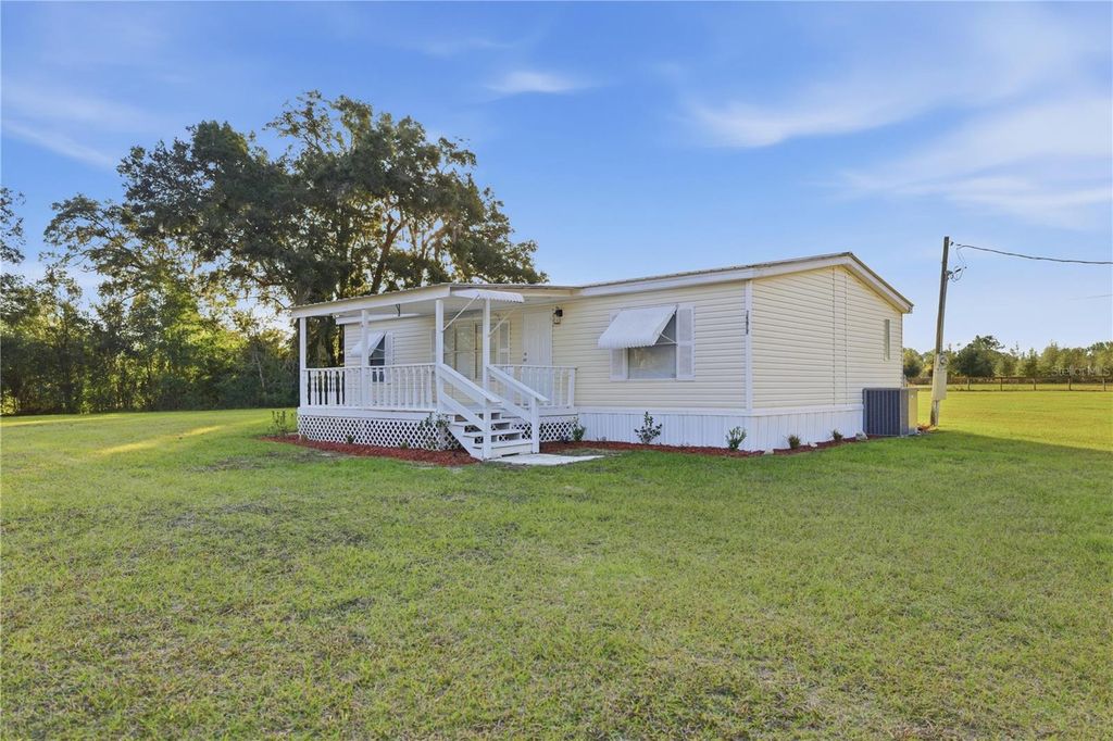 Photo of 13705 NE 14th Avenue, Citra, FL 32113 (MLS # OM714815)