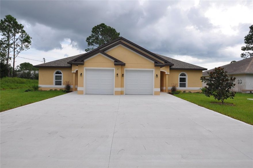 Gorgeous and modern luxury duplex with 3 bedrooms, 2 baths and one car garage, 1193 sq ft. located in the heart of Palm Coast. Tile through out the home. Kitchen and bathrooms are showcased in granite and tiles through out. Screened back porch and comfortable lay out of the unit. Located on a quiet street with easy access to schools, beaches and all the shopping. Call today to get your a tour!