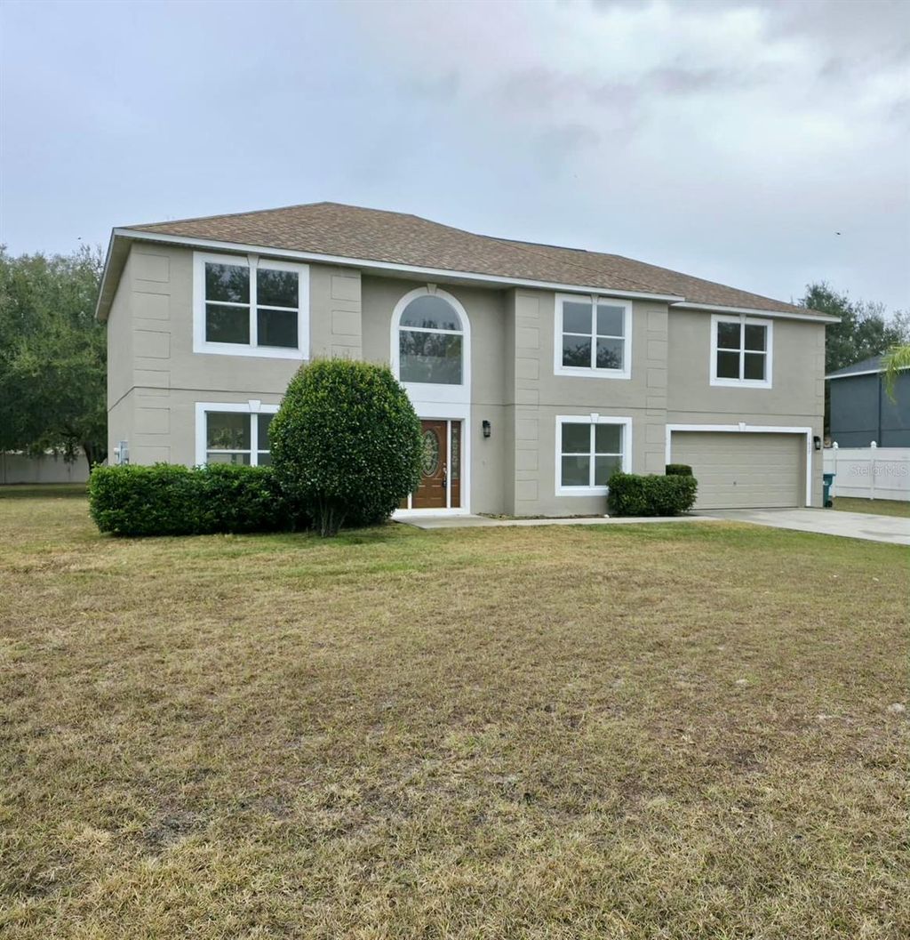 Photo of 1637 Myrtle Lake Avenue, Fruitland Park, FL 34731 (MLS # G5109434)