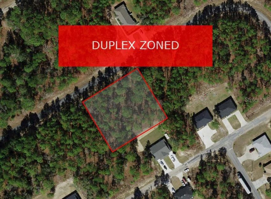 **DUPLEX ZONED** LARGE LOT - .83 ACRES!! Seize the chance to own prime multifamily land in Citrus Springs, zoned perfectly for a duplex. This level lot sits flush with the street, making construction easier and more cost-effective, with water connections already available. Located in a thriving neighborhood with established infrastructure, it’s ideal for generating rental income or housing multiple families. A duplex here offers dual rental streams or the option to live in one unit while renting out the other, maximizing your investment. Multifamily properties in this growing area see strong demand, promising stable income and potential long-term appreciation. Enjoy freedom from HOA fees and nearby community amenities like tennis courts, playgrounds, and a golf course. With quick access to US-41 and FL-40, Tampa, Orlando, and stunning Gulf beaches are within easy reach, while Rainbow Springs State Park is only 20 minutes away. Don’t miss this excellent investment opportunity in a sought-after Florida location!