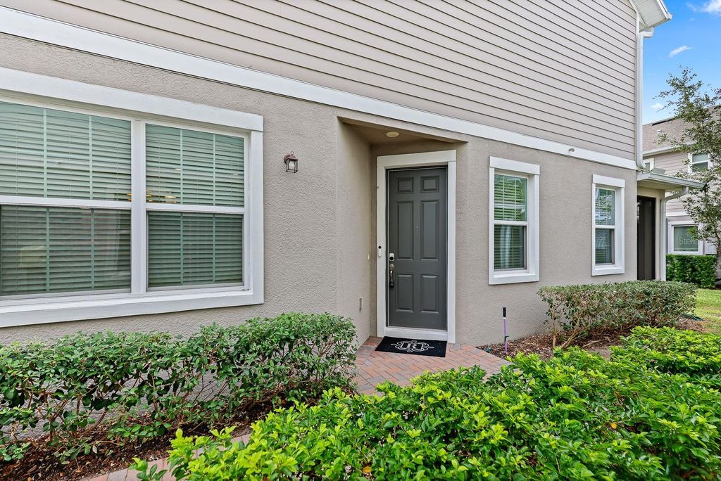 Photo of 5747 Spotted Harrier Way, Lithia, FL 33547 (MLS # TB8461354)