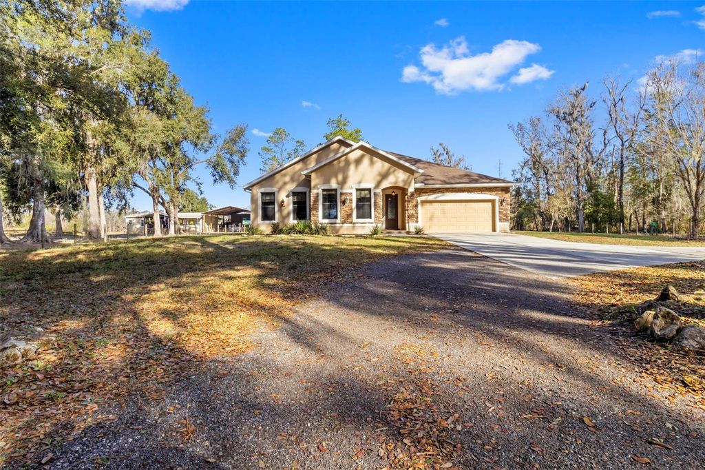 Photo of 765 Sloans Ridge Road, Groveland, FL 34736 (MLS # TB8467162)