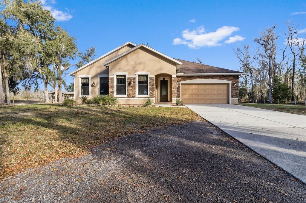 Photo of 765 Sloans Ridge Road, Groveland, FL 34736 (MLS # TB8467162)