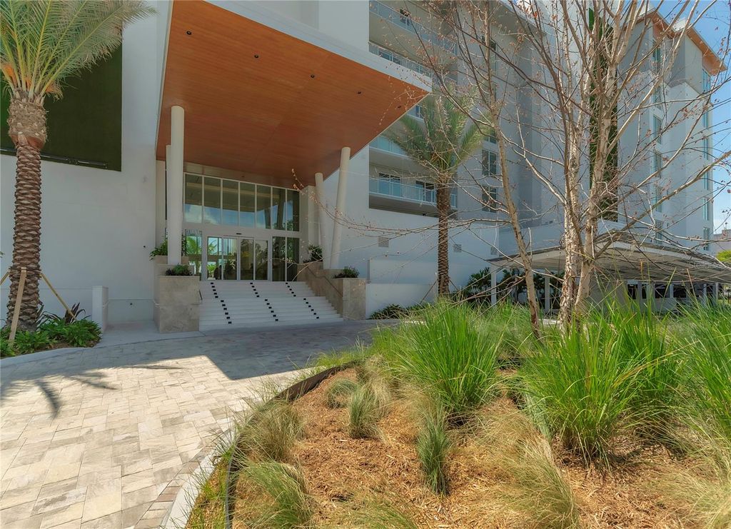 Photo of 1020 Sunset Point Road #302, Clearwater, FL 33755 (MLS # TB8419333)