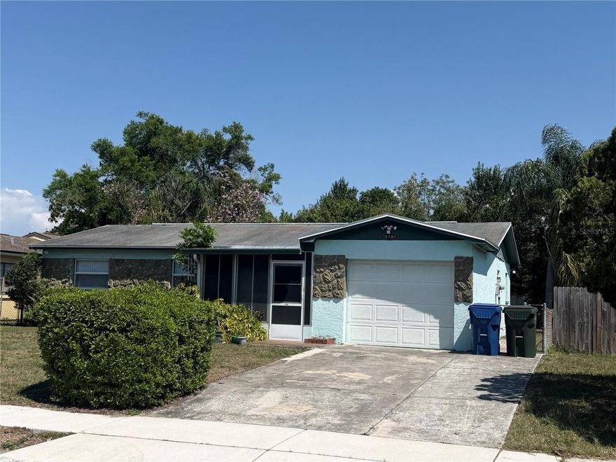 Investor special in desirable Largo/Seminole area! Solid three-bedroom, one-bathroom block home with a 1-car garage ready for renovation. This charming home just needs cosmetic updates throughout, making it an ideal project for investors or handy buyers looking to add value. Features include a large screened front lanai, living room with two closets and front facing window, kitchen with a pantry (no appliances), and washer/dryer hookups in the garage. The primary bedroom has newer laminate flooring, and the bathroom already has some updates. Situated on a fully fenced lot with an additional fenced side area for vehicle parking, multiple storage sheds, and no HOA restrictions. Roof replaced in 2017. Non-flood zone. Ideally located near Walsingham Park, Largo Golf Course, and the Florida Botanical Gardens, with a short drive to the Indian Rocks Causeway and Gulf beaches. Shopping, dining, Largo Mall, and the Pinellas Trail are all close by. Bring your vision and enjoy endless opportunities. Multiples offers , please submitt hight and best by the end of the day 4/