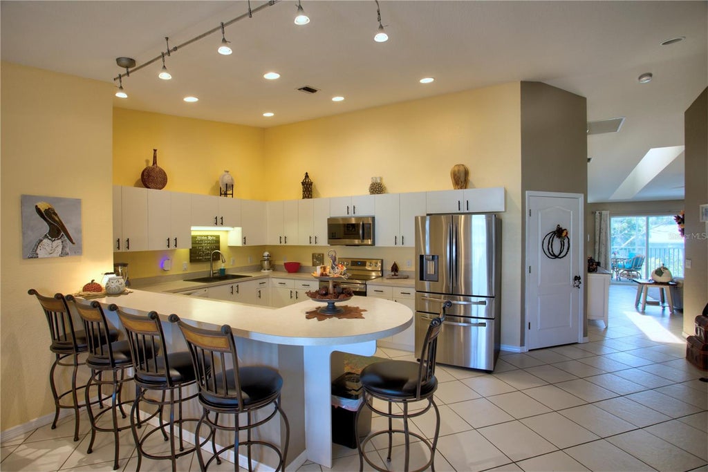 Photo of 8101 Memory Lane #220, Rotonda West, FL 33947 (MLS # D6149178)