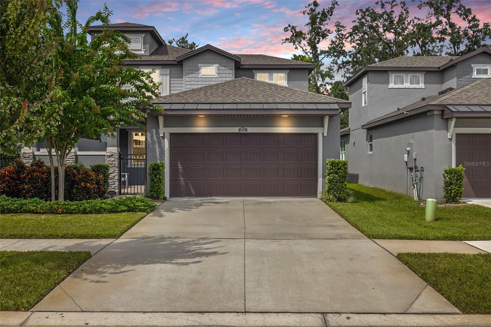 CLINK the LINK to see our video: https://listings.firelightimages.com/sites/rxekmok/unbranded Welcome to 274 Villa Luna Lane, a beautifully designed 4-bedroom, 2.5-bath home completed in 2021, offering 2,198 sq. ft. of modern living space on one of the largest lots in this sought-after gated community. This home combines comfort, style, and convenience with a rare setting that backs up to peaceful conservation and a scenic walking trail, giving you privacy and a true connection to nature right outside your back door. Step inside to an inviting open-concept layout filled with natural light. The gourmet kitchen is the heart of the home, featuring quartz countertops, shaker-style soft-close cabinetry, custom storage drawers, a large island with bar seating, and premium stainless-steel appliances. The kitchen seamlessly flows into the dining and living spaces, creating the perfect setting for gatherings or everyday living. The spacious primary suite is a private retreat, complete with dual vanities, quartz finishes, a walk-in shower, and a generous walk-in closet. Three additional bedrooms provide plenty of flexibility for family, guests, a home office, or a media space. Both full bathrooms are designed with dual sinks for convenience, and the laundry room includes washer and dryer. Every detail has been considered, from ceramic tile flooring throughout to ceiling fans in every room and on the lanai, hurricane storm panels, and a 2-car garage. Outdoor living is just as inviting with an extended screened lanai that opens to your spacious backyard and tranquil conservation views. Residents of this gated community enjoy a brand-new pool, walking paths, and dual-entry access, along with maintenance-free living. HOA fees cover exterior maintenance, landscaping, internet, and cable, ensuring peace of mind and low-maintenance ownership. Ideally located near USF, Downtown Tampa, Hyde Park, Tampa International Airport, and the Gulf Coast beaches, this home offers a perfect balance of modern luxury and everyday convenience. Schedule your private showing today and discover why this property is truly special.