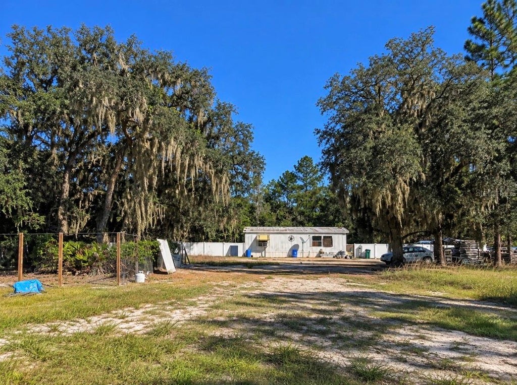 Photo of 50 Kelly Ridge Road, Frostproof, FL 33843 (MLS # L4965797)