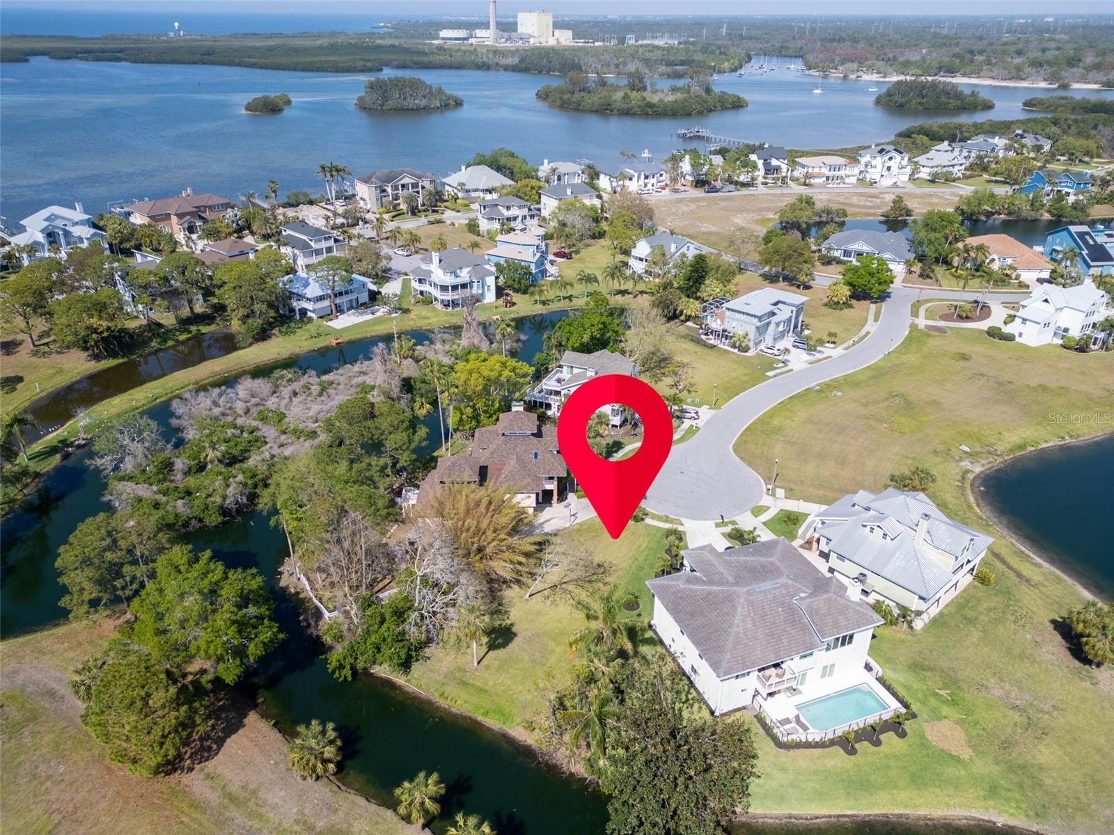 Incredible opportunity to build your custom home on a premium 0.20-acre lot in one of Tarpon Springs' most desirable waterfront communities. Located at the end of a private cul-de-sac, this lot offers privacy, tranquility, and picturesque water views from multiple angles. The lot is cleared, level, buildable, and surrounded by luxury homes in a beautifully maintained, guard-gated community.
Enjoy an exceptional lifestyle with community amenities that include a 24-hour manned security gate, private clubhouse, pool and spa, tennis courts, playground, community pier with gazebo, and a scenic 15-acre lake. Utilities are readily available, and the low HOA fees make this an ideal location for primary residences or second-home buyers seeking upscale Florida living.
Conveniently located just minutes from the historic Tarpon Springs Sponge Docks, Fred Howard Park and Beach, shopping, dining, and top-rated schools. Don’t miss your chance to own a piece of paradise along Florida’s Gulf Coast.