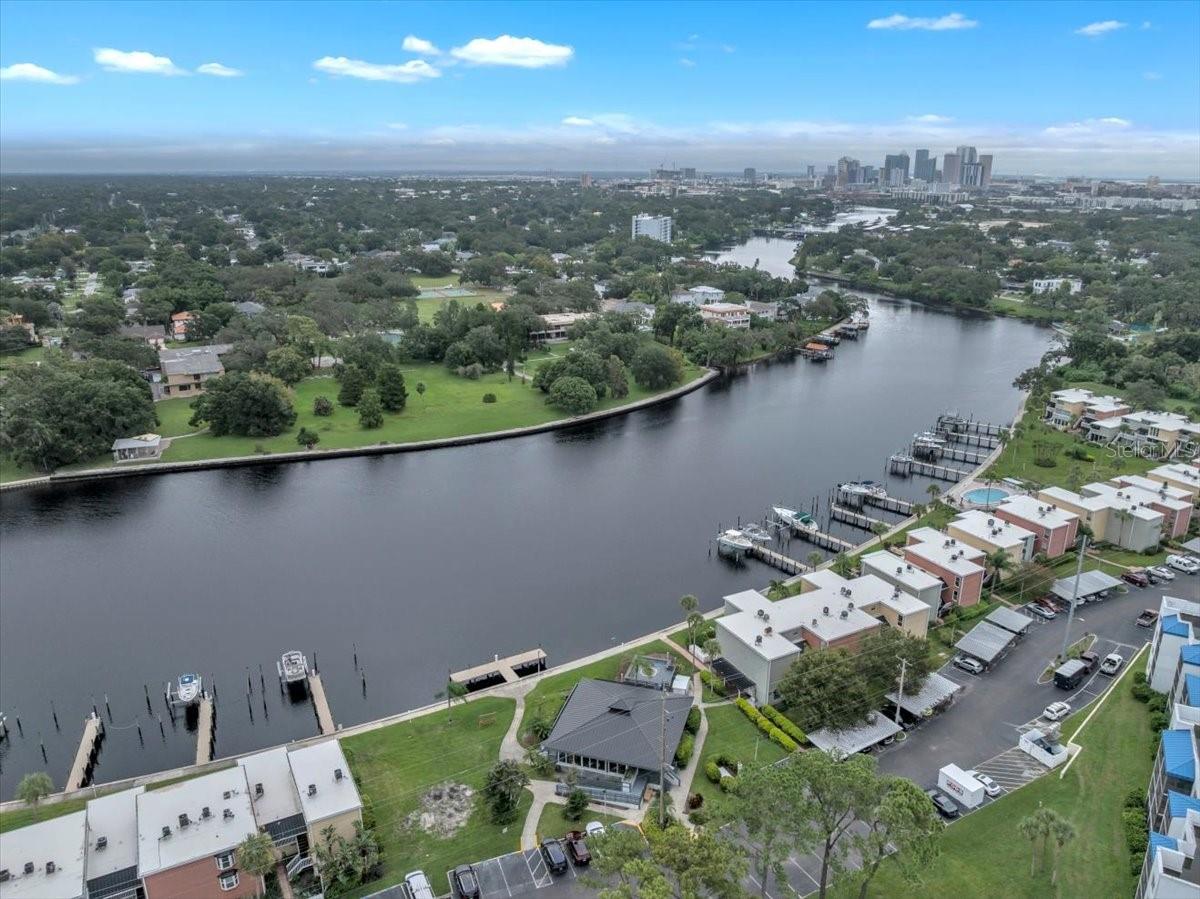 BEAUTIFUL *FULLY RENOVATED* 1 Bedroom, 1 Bath, FIRST FLOOR condominium LOCATED ALONG THE HILLSBOROUGH RIVER in The Marina Club of Tampa Bay. This fully renovated residence showcases an open great room floor plan with light, neutral finishes and modern upgrades throughout.
Highlights include: NEW ROOF (2022); brand new AC system (2022); brand new hot water heater; a completely remodeled kitchen with Level 3 quartz countertops, solid wood white cabinetry, stainless steel farmhouse sink, and new stainless steel appliances; 4-stool high-top kitchen seating; and fresh, light-colored Sherwin Williams interior paint with updated baseboards.
The bathroom has been beautifully finished with solid wood cabinetry, quartz countertops, floor-to-ceiling wall tiling, and Italian tile flooring. Additional upgrades include: all-new CPVC plumbing, updated electrical outlets and switches, washer/dryer connections, and a Triple Impact vinyl sliding glass door (seller-paid, scheduled for installation in the coming weeks).
Enjoy a spacious private patio overlooking the serene Hillsborough River along with tile flooring throughout, immaculate condition, and renovations completed by a licensed general contractor with all necessary permits.
The Marina Club of Tampa Bay is a GATED COMMUNITY featuring 2 swimming pools, spa, clubhouse, dock, boat slips for rent (when available), tennis courts, and pickleball courts. LOW HOA fees cover water, sewer, trash, basic cable, exterior maintenance, property management, and more.
All of this in a prime Tampa location just minutes from I-275, I-4, Downtown Tampa, Tampa International Airport, Saint Joseph’s Hospital, Raymond James Stadium, shopping, dining, and entertainment. Immediate occupancy available—schedule your private tour today and don’t miss the chance to call this RIVERFRONT GEM your new home! Special Assessment has been paid in full by the seller! This home flooded during the hurricane in 2024 and has been fully repaired and renovated from the ground up by the seller! Schedule your showing today!