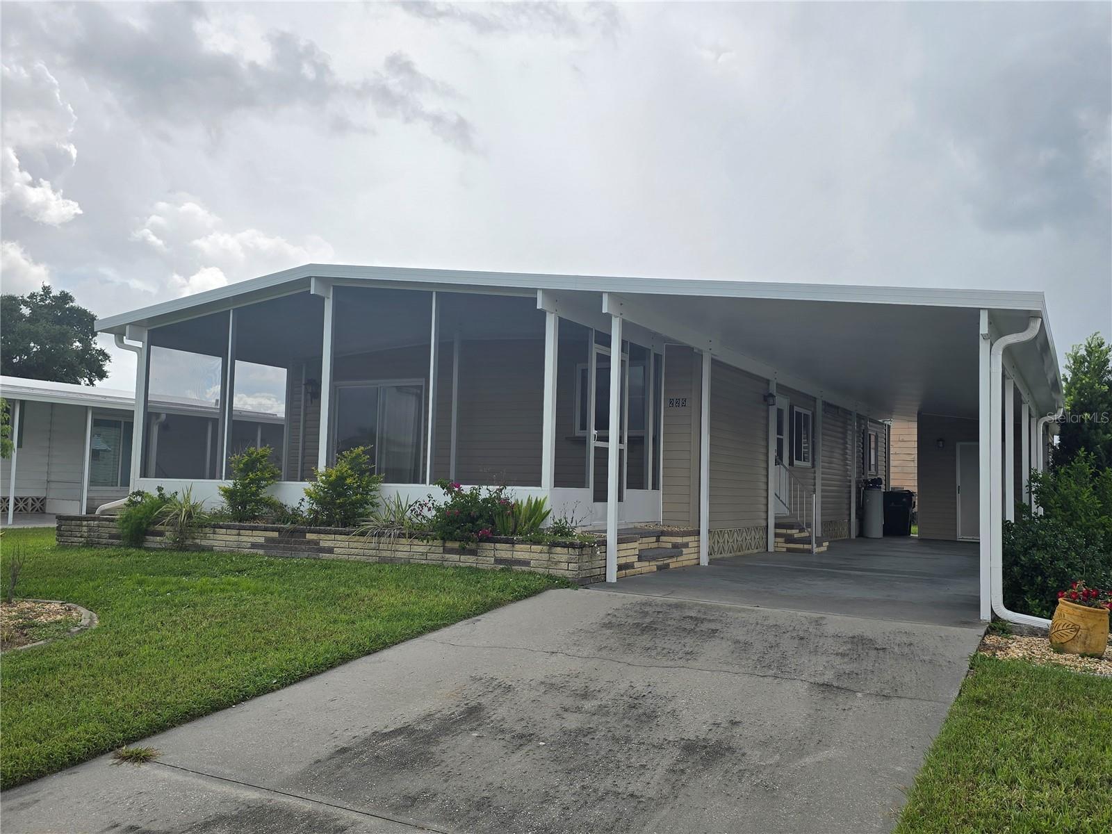Just like new! This manufactured home has newer roof and rebuilt lanai since last hurricane , Master walk-in closet has California closet design. Beautiful laminate floors throughout. An additional 230 sq.ft. with Florida Room. Experience a great Florida lifestyle in this 55 Plus gated community with low monthly homeowner fees that includes clubhouse, pool, amazing recreational facilities.Best of all prime water access with community dockage that leads to the Myakka River and Gulf of Mexico.This active 55 Plus gated community has so much to offer with all kinds of clubs such as theater, bicycle, golfing, boating, craft clubs and much more. Enjoy strolling around the lovely streets or use your own golf cart to drive to the docks, the club house, pool and so much more.