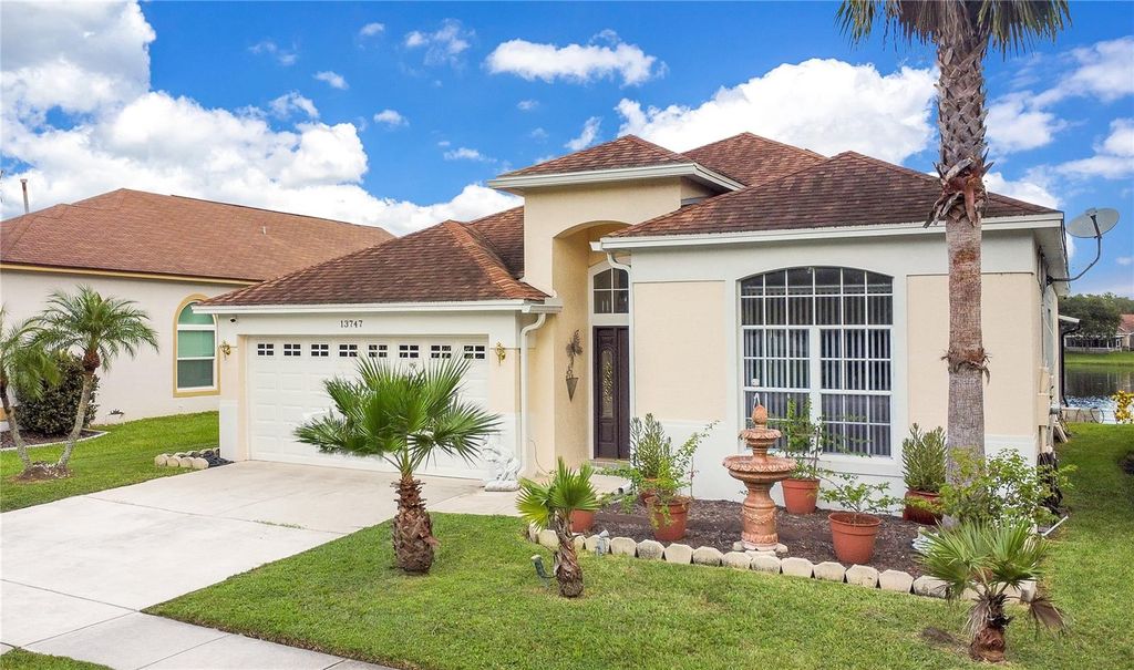 Photo of 13747 Waterhouse Way, Orlando, FL 32828 (MLS # TB8482752)