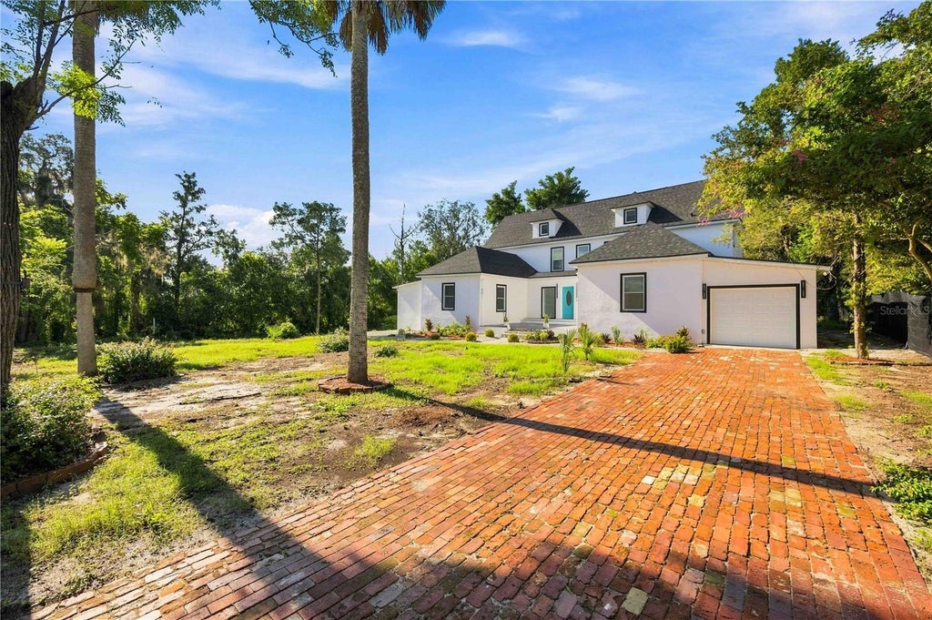 Photo of 401 Old School House Road E, Loughman, FL 33858 (MLS # S5157031)