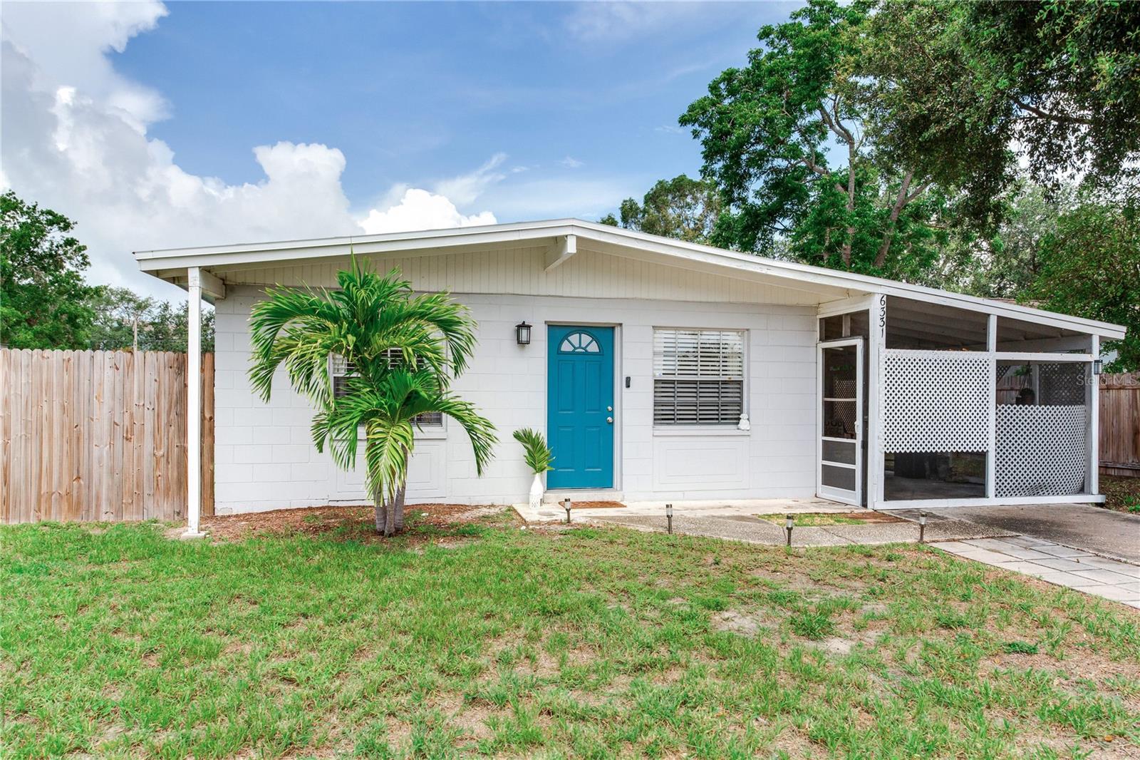 Welcome to this charming and move-in-ready 3-bedroom, 1 bath bungalow situated on over 1/4-acre lot in South Tampa. With 925 sq ft of well-designed living space, this home offers a perfect balance of comfort and modern updates. The stylish interior with living room and dining room combo features classic terrazzo flooring and an updated kitchen with a center island—ideal for cooking and entertaining. Recent upgrades include a 2019 HVAC system and a brand-new water heater in 2024. Enjoy peace of mind with no history of flood or hurricane damage. The layout extends seamlessly outdoors to a spacious covered patio, with a large backyard that is big enough for all of your dreams! Stay, play, and imagine endless possibilities in this expansive outdoor space, perfect for relaxing, gardening, or future expansion. Additional highlights include an attached shed, a utility room with a washer and dryer (both included), and plenty of space for storage or hobbies. Whether you're a first-time buyer or an investor, this well-maintained property offers excellent value and potential. Don’t miss this incredible opportunity!