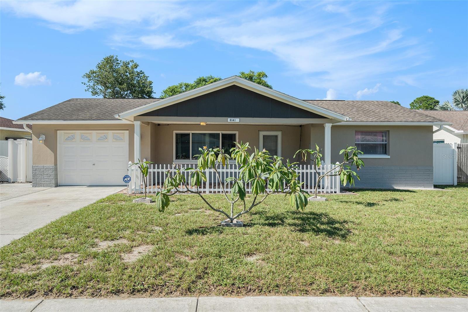 Welcome to 6141 Staunton Drive, a charming home in a quiet Holiday neighborhood that combines comfort, functionality, and convenience. From the moment you arrive, you’ll love the spacious front patio, perfect for morning coffee or relaxing evenings. Step inside to an open floor plan filled with natural light, creating a warm and inviting atmosphere.
The home features a large den area ideal for a home office, playroom, or second living space. The open-concept kitchen makes entertaining easy, while the updated flooring in both bedrooms adds a fresh, modern touch. A highlight of the home is the enclosed sunroom with expansive windows, offering a perfect spot to enjoy the view year-round.
Outside, the fenced backyard provides privacy and plenty of room for pets or outdoor activities, complete with a large shed for extra storage. Conveniently located near shopping, dining, and entertainment, this property offers the best of both comfort and accessibility.
Don’t miss the opportunity to make this versatile home yours!