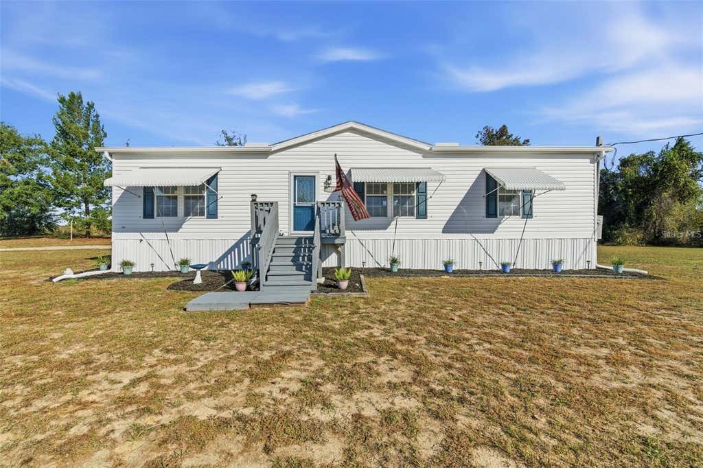 Photo of 12441 Hexam Road, Weeki Wachee, FL 34613 (MLS # W7887659)