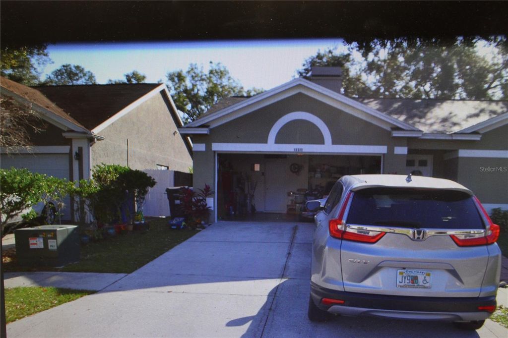 Photo of 11111 Bramblebrush Street, Tampa, FL 33624 (MLS # TB8479798)