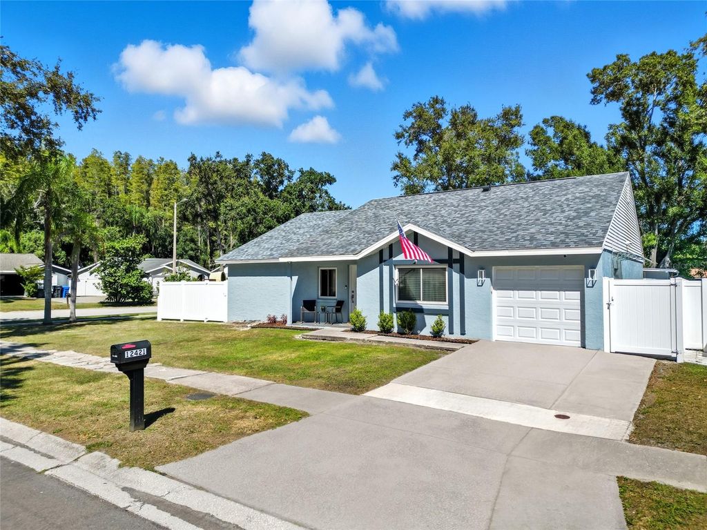 Photo of 12421 Pepperfield Drive, Tampa, FL 33624 (MLS # TB8436511)