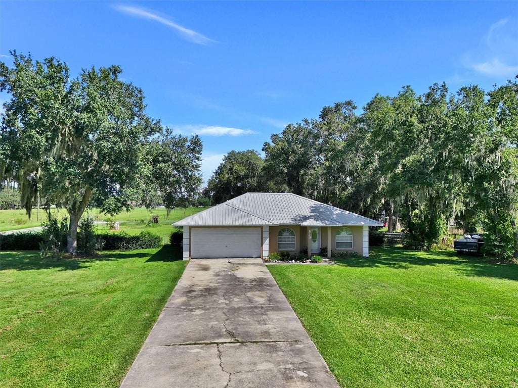 Photo of 510 Cloverleaf Drive, Lithia, FL 33547 (MLS # TB8541400)