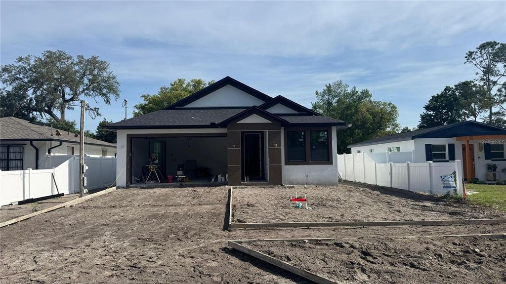 Photo of 1405 W Arctic Street, Tampa, FL 33604 (MLS # TB8502611)