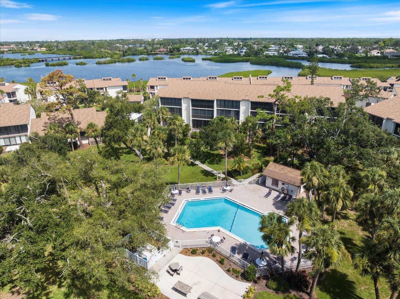 Now Booking for the 2026 Season! Ground Floor 2-Bed/2-Bath Condo in Bird Bay Village – Steps from the Pool. Welcome to your seasonal retreat at 832 Bird Bay Way, where comfort meets convenience in the heart of Venice, Florida. This updated ground-floor condo is offered turnkey furnished and features 2 bedrooms and 2 full bathrooms, making it the perfect home away from home for your time in paradise. Enjoy an open-concept layout with luxury vinyl plank flooring throughout, a modern kitchen with granite countertops, stainless steel appliances, and wood cabinetry. The spacious living area opens directly to a tiled, enclosed lanai with peaceful views and a private deck just steps from the Phase II pool—ideal for morning coffee or evening relaxation. The primary suite includes a comfortable queen bed, updated en-suite bathroom with a tiled walk-in shower, and generous closet space. The guest bedroom is well-appointed and adjacent to a second updated bathroom with a tub/shower combo. A full-size washer and dryer are included for added convenience. Located in the amenity-rich community of Bird Bay Village, you’ll have access to multiple pools, tennis and pickleball courts, a fitness center, clubhouse, library, and social activities throughout the season. The Legacy Trail is just outside your door, offering miles of scenic biking and walking paths. You're also less than 10 minutes from Historic Downtown Venice, world-class beaches, shopping, dining, and entertainment. Available for seasonal rental—book now and enjoy the Florida lifestyle in this vibrant, friendly community!