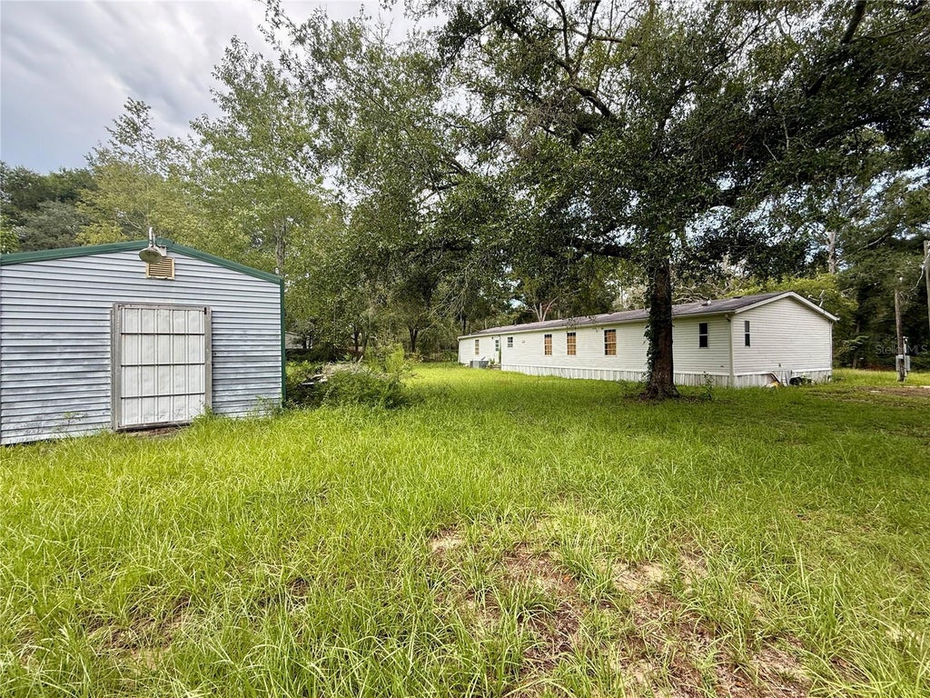 Photo of 11360 NE State Road 24, Archer, FL 32618 (MLS # GC542927)