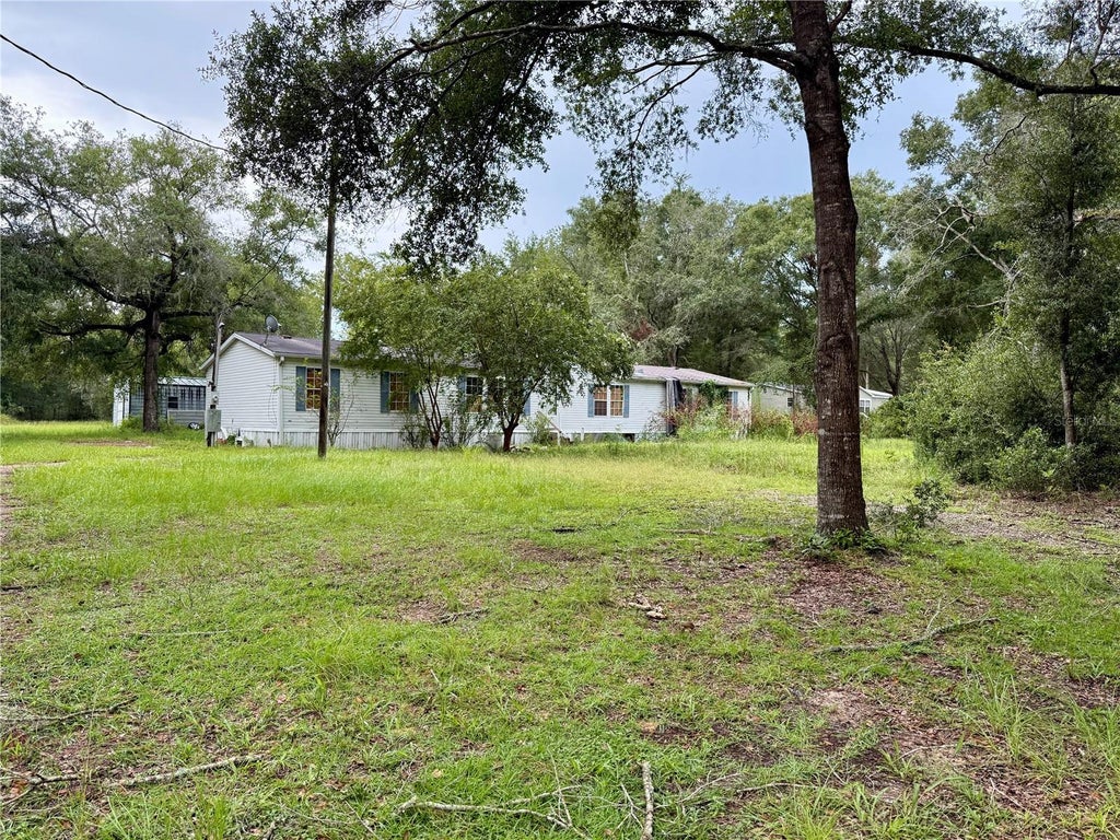 Photo of 11360 NE State Road 24, Archer, FL 32618 (MLS # GC542927)