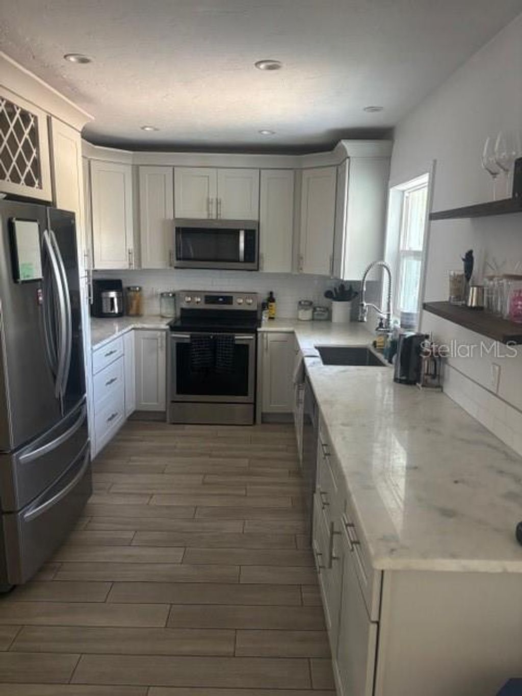 Photo of 7503 Starfish Drive, Sarasota, FL 34231 (MLS # A4691968)