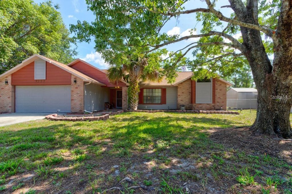 Photo of 3237 Newmark Drive, Deltona, FL 32738 (MLS # O6401233)