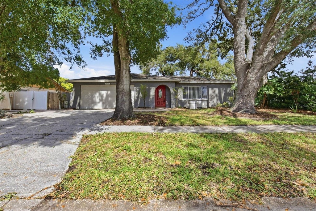 Photo of 7730 Hinsdale Drive, Tampa, FL 33615 (MLS # O6452429)
