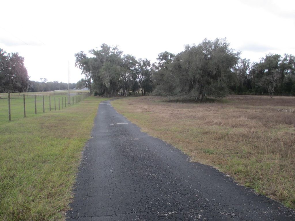 Photo of 9851 E Thomas Road, Floral City, FL 34436 (MLS # OM714829)