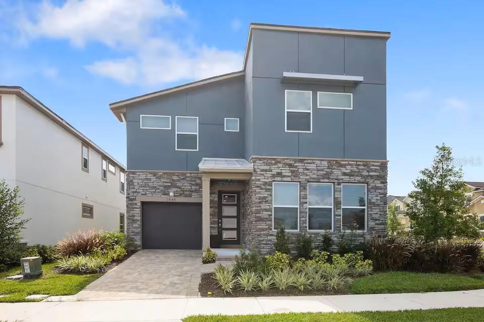 Photo of 1848 Sandy Park Trail, Kissimmee, FL 34747 (MLS # O6447156)