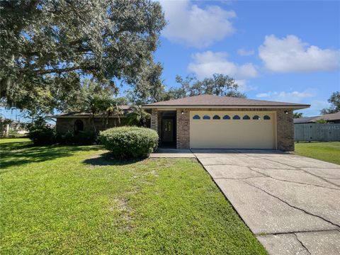 Photo of 5030 Creekview Lane, Lakeland, FL 33811 (MLS # O6341953)