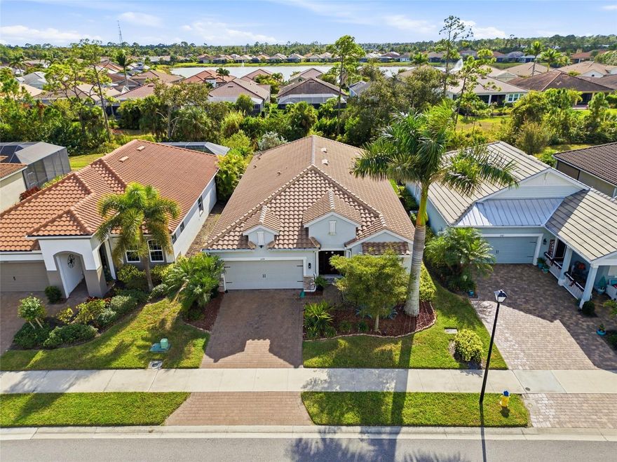 Don't Miss Out On This Opportunity, Owners have moved to their new home and have just lowered the price on this beautifully appointed 3-bedroom, 2.5-bath home in the sought-after Renaissance at West Villages community in Venice. Built in 2019, this stylish contemporary residence offers an open floor plan, a versatile flex room, bonus spaces ideal for a home office or den, and a spacious 2-car garage with an electric vehicle charging station.  Flood Insurance NOT required with this home.
The owners have invested extensively in upgrades, including a $60,000 tile roof (2024), custom electric fireplace (2025), and a custom modular library that is removable. Additional updates include new dishwasher (2025), water heater (2025), updated kitchen and bath fixtures, exterior paint (2025), water softener, gutters, and rear yard metal fencing.
The upgraded gourmet kitchen features quartz countertops, subway tile backsplash, upgraded appliances, and a large center island with breakfast bar, perfect for casual dining and entertaining. The living room opens seamlessly to the lanai through sliding glass doors, creating an inviting indoor-outdoor living experience with tranquil views.
The primary suite offers a tray ceiling, walk-in closet, and a private en-suite bath with dual sinks and an oversized walk-in shower. Storm panels are included for added peace of mind.
Renaissance at West Villages is a Tuscan-style gated community offering resort-style amenities, including a clubhouse with fitness center and full kitchen, social activities, a heated pool, tennis and pickleball courts, playground, and scenic walking trails—all with low HOA fees. Located across the street from downtown Wellen Park where you will find restaurants, bars, and shoppes, and be able to enjoy family farmers markets, live music, and community gatherings.  Just minutes away, explore Venice’s historic downtown, featuring charming boutiques, architectural landmarks, and peaceful parks.

Enjoy Florida’s natural beauty by searching for shark teeth along Caspersen Beach or relaxing at nearby coastal favorites such as Venice Beach, the Venice Fishing Pier, and Brohard South and North Beaches. Outdoor enthusiasts will appreciate the option to rent bicycles from Venice Bikes and Trikes and ride along the scenic Legacy Trail.

Experience local wildlife and serene surroundings at Shamrock Park and Nature Center or Venetian Waterway Park. Shopping and entertainment abound at the Venice Farmers Market and Ideal Classic Cars. For fishing and stunning waterfront views, South Jetty Beach is a must-visit destination.