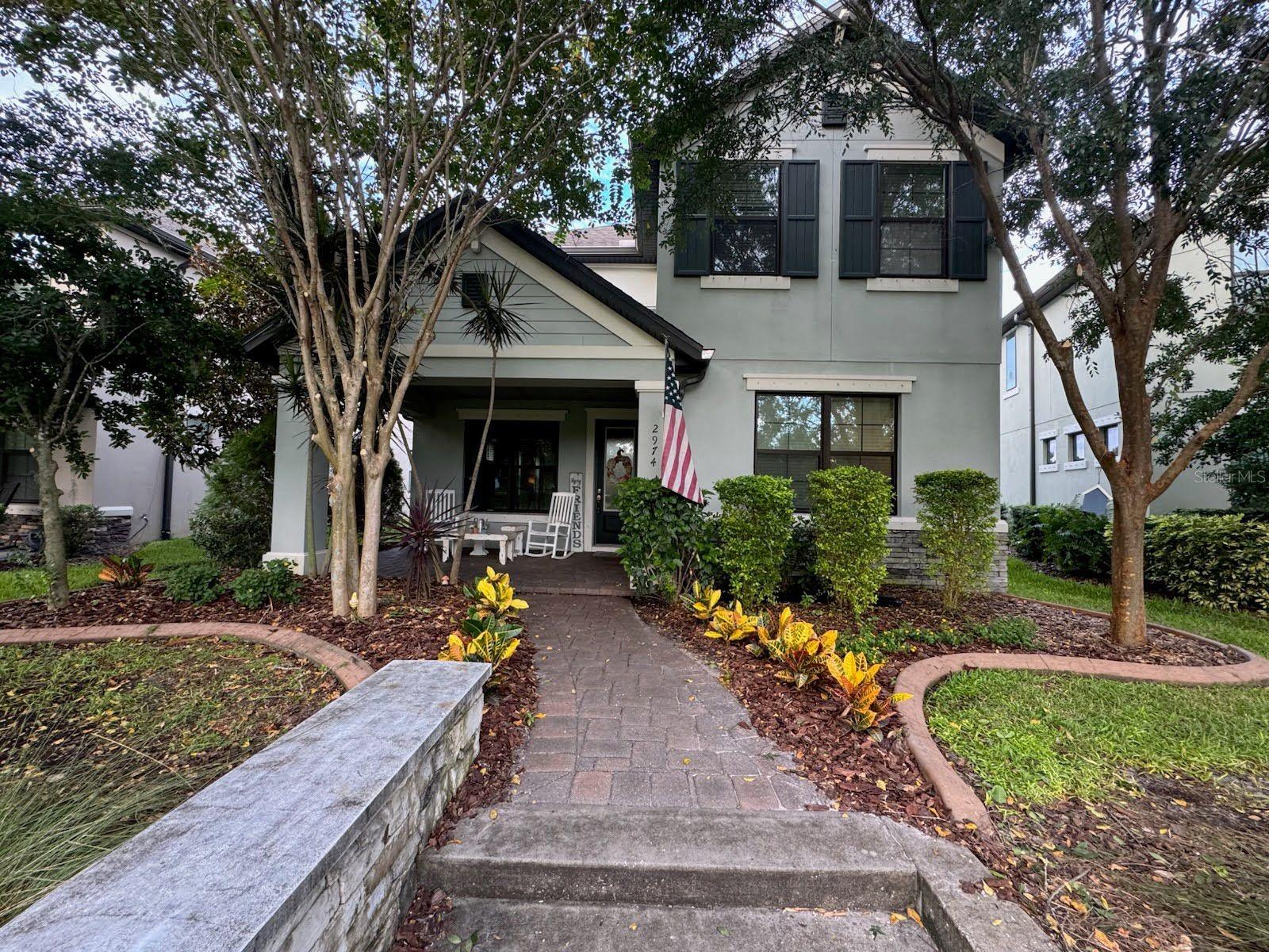 Welcome to Starkey Ranch living at its finest! This 2016 Barrington by MI Homes is beautifully appointed and perfectly positioned on a rare premium lot overlooking open green space. From the inviting front porch to the screened lanai, every detail blends comfort with style. The chef’s kitchen showcases granite counters, custom cabinetry, double ovens, gas cooking, and a spacious island that anchors the open design. Crown molding, rich flooring, designer finishes, and abundant natural light elevate the interiors. Enjoy walkability to the top-rated Starkey Ranch K-8, the new library, sports fields, pools, trails, and parks. Minutes to Tampa, shopping, dining, and medical centers, this thoughtfully upgraded home offers a seamless mix of convenience, community, and true Florida lifestyle.