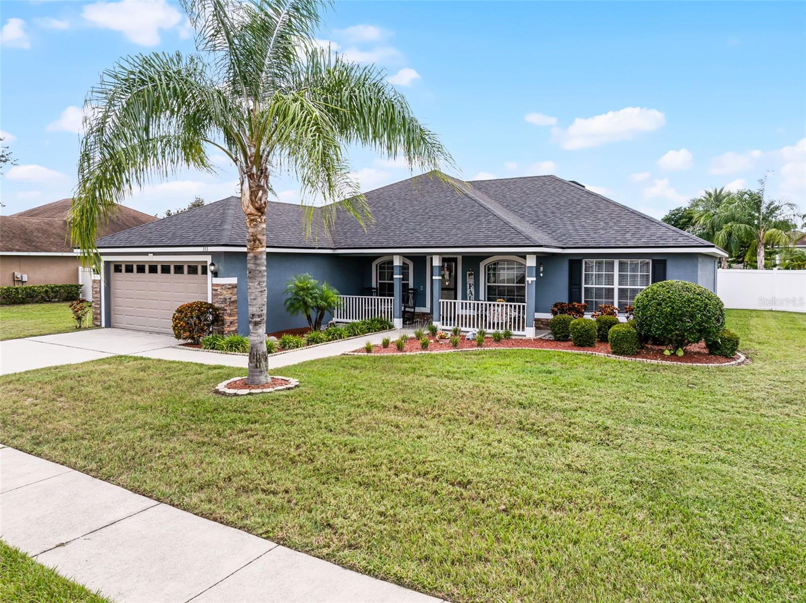This beautiful 3-bedroom, 2-bath home with a den is located in the highly desirable gated community of Mandolin.
From the moment you arrive, the charming front porch welcomes you—a perfect spot to sit and relax. Inside, the split bedroom floor plan ensures privacy for the entire family, while the spacious great room, filled with natural light, features a striking reclaimed wood accent wall that adds warmth and character.
The well-equipped kitchen is a chef’s delight, offering cherry wood cabinetry with crown molding, brushed nickel hardware, an upgraded stainless steel appliance suite, and thoughtful design elements such as a closet pantry, new farmhouse sink with gooseneck faucet, and undermount task lighting. A breakfast bar and breakfast nook provide casual dining options, while the formal dining room flows seamlessly into the kitchen—making entertaining effortless.
Additional highlights include a private study/den, new luxury vinyl plank flooring, freshly painted interior, and soaring vaulted ceilings.
The generously sized primary suite is a true retreat, featuring two walk-in closets and plush wall-to-wall carpeting. The en-suite bathroom offers dual vanities with new Moen faucets, a garden tub, walk-in shower, and private water closet.
Outdoor living is just as inviting with a fully screened lanai overlooking the fenced backyard—perfect for year-round enjoyment.
Additional features include: Two guest bedrooms, Laundry room, New toilets & faucets throughout, New water heater (2025), Architectural shingle roof (2022), Exterior stone façade & carriage lights, Glass storm entry door, Decorative stone landscape edging, Irrigation system and a 2-car garage with door opener.
Conveniently located near shopping, dining, major highways, and Legoland, this home offers the perfect blend of comfort, convenience, and luxury.
Bonus: Home is being offered partially furnished!