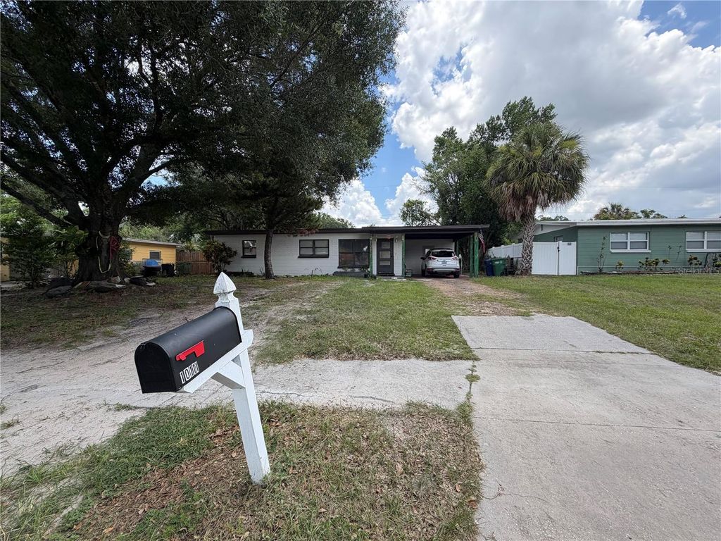 Photo of 10111 N Ola Avenue, Tampa, FL 33612 (MLS # TB8524909)