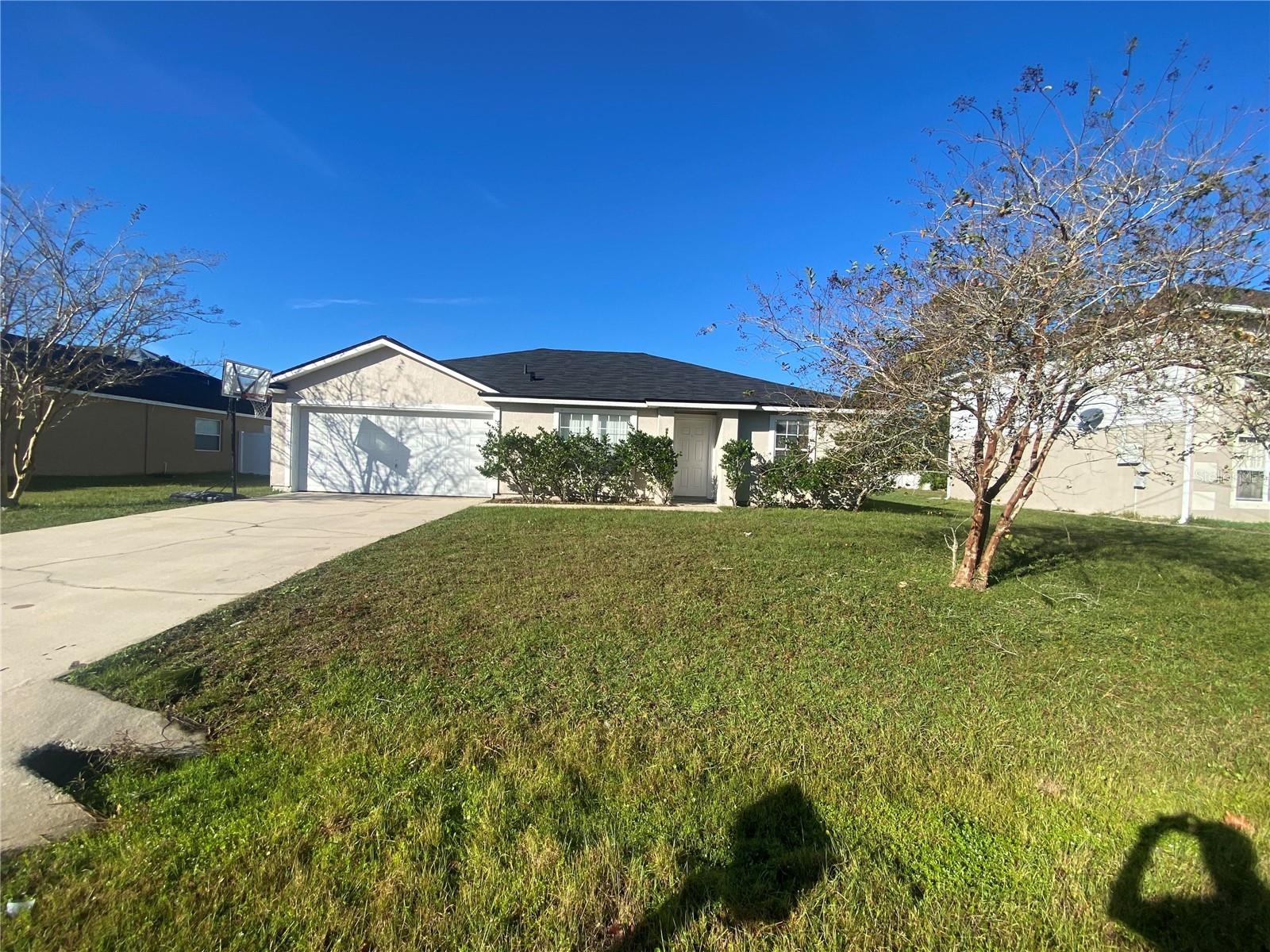 Welcome to 18 Roxbury Lane, a charming single-family home nestled in Palm Coast's sought-after 32164 neighborhood. This well-maintained 4-bedroom, 2-bathroom residence spans 1,475 sq?ft of thoughtful living space on a spacious 10,018?sq?ft lot. Built in 2004, this home blends comfort, functionality, and classic Florida style. Partially fenced and the added convenience of an indoor wash/dryer. Conveniently located near shopping, highways and hospitals. With the nearby highways, commutes to Daytona and St. Augustine are about 40 minutes away and commutes to Jacksonville and Orlando are within 90 minutes. Call now to visit this charming rental.