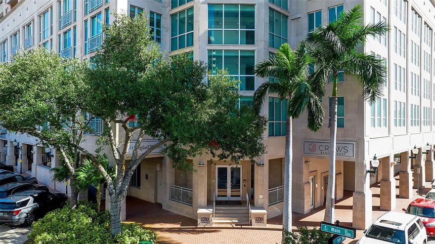 In the vibrant heart of downtown Sarasota, 1350 Main places you just moments from galleries, boutiques, restaurants, Marina Jack, the theatre district, and a quick drive to Lido Beach and St. Armands Circle. It’s the kind of address that makes city living feel both effortless and energizing. Perched on the 7th floor, this light-filled residence is ready for your personal touch. From the balcony and main living areas, peaceful views of the pool and courtyard create a quiet counterpoint to the lively city beyond. Inside, the thoughtful layout includes two bedrooms and two full baths, with the guest room featuring a built-in desk—perfect for work or creative pursuits. The main suite offers a generous custom-designed closet and a spa-like bathroom with dual sinks, a walk-in shower, and a garden tub. Trey ceilings and crown molding add understated elegance, while the kitchen—with stainless steel appliances, granite countertops, and excellent storage—makes everyday living a pleasure. Step onto the balcony to enjoy Sarasota’s mild winters, morning sunshine, and the soothing view of gardens and water below. This amenity-rich community elevates daily life with a club room, catering kitchen, fitness center, library, conference room, and attentive concierge services. Secured under-building parking for one car completes a truly desirable downtown package. Call today for your private showing—your next chapter in Sarasota living awaits.